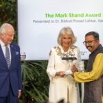 ৰাণী কেমিলাই আৰণ্যকক প্ৰদান কৰিলে সন্মানীয় মাৰ্ক শ্বাণ্ড বঁটা